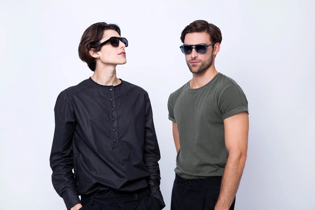 Mujer y hombre posan con gafas de sol diseñadas por OscarLeon para Optica Florit